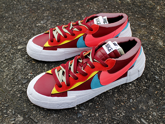 BLAZER LOW “SACAI x KAWS” TEAM RED/HOT LAVA - 01